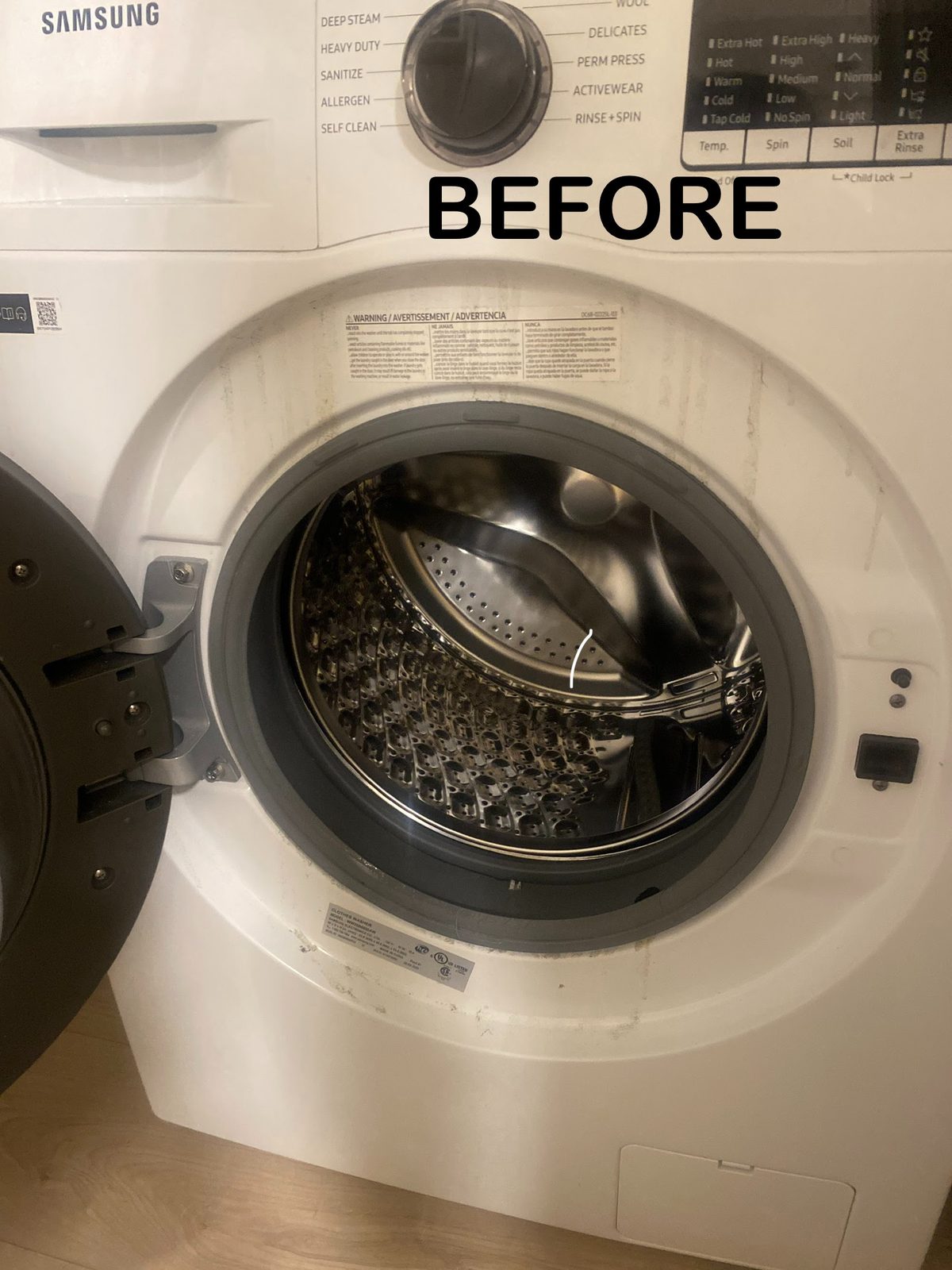 Before — grimy washer drum and gasket