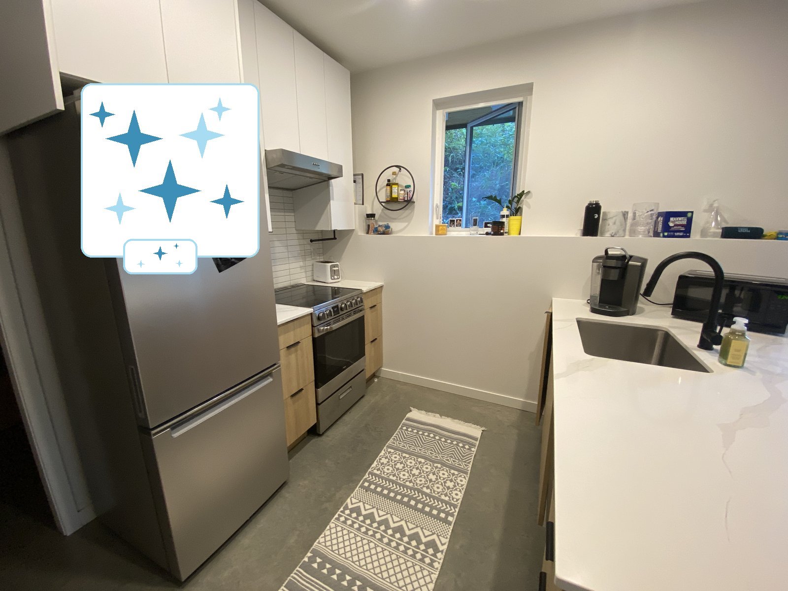 Deep-cleaned kitchen with spotless counters and appliances, cleaned by Kendal